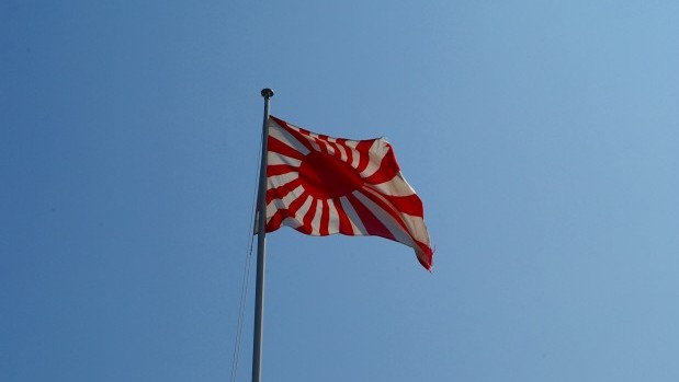 You are currently viewing CWJC Sends Letter to President of France Protesting Japanese Rising Sun Flag