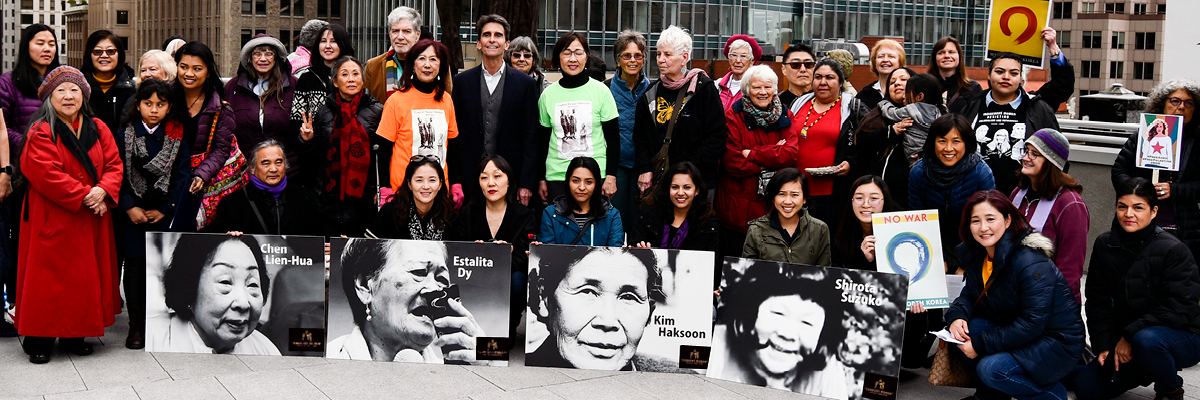 CWJC members with portraits of “comfort women”